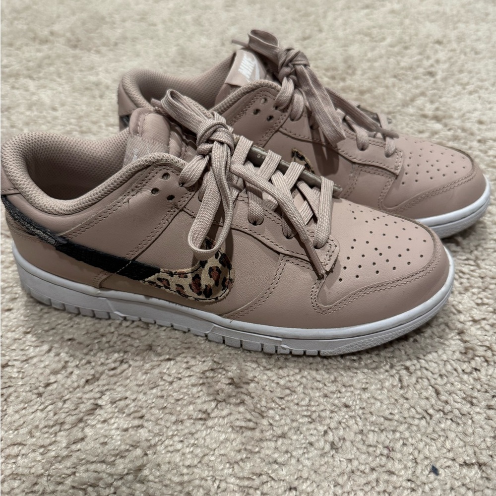 Women's Dunk Low Sneakers in Pink by Nike Size US 7